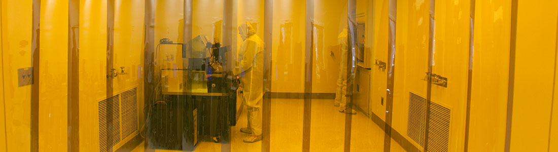 technicians working in cleanroom